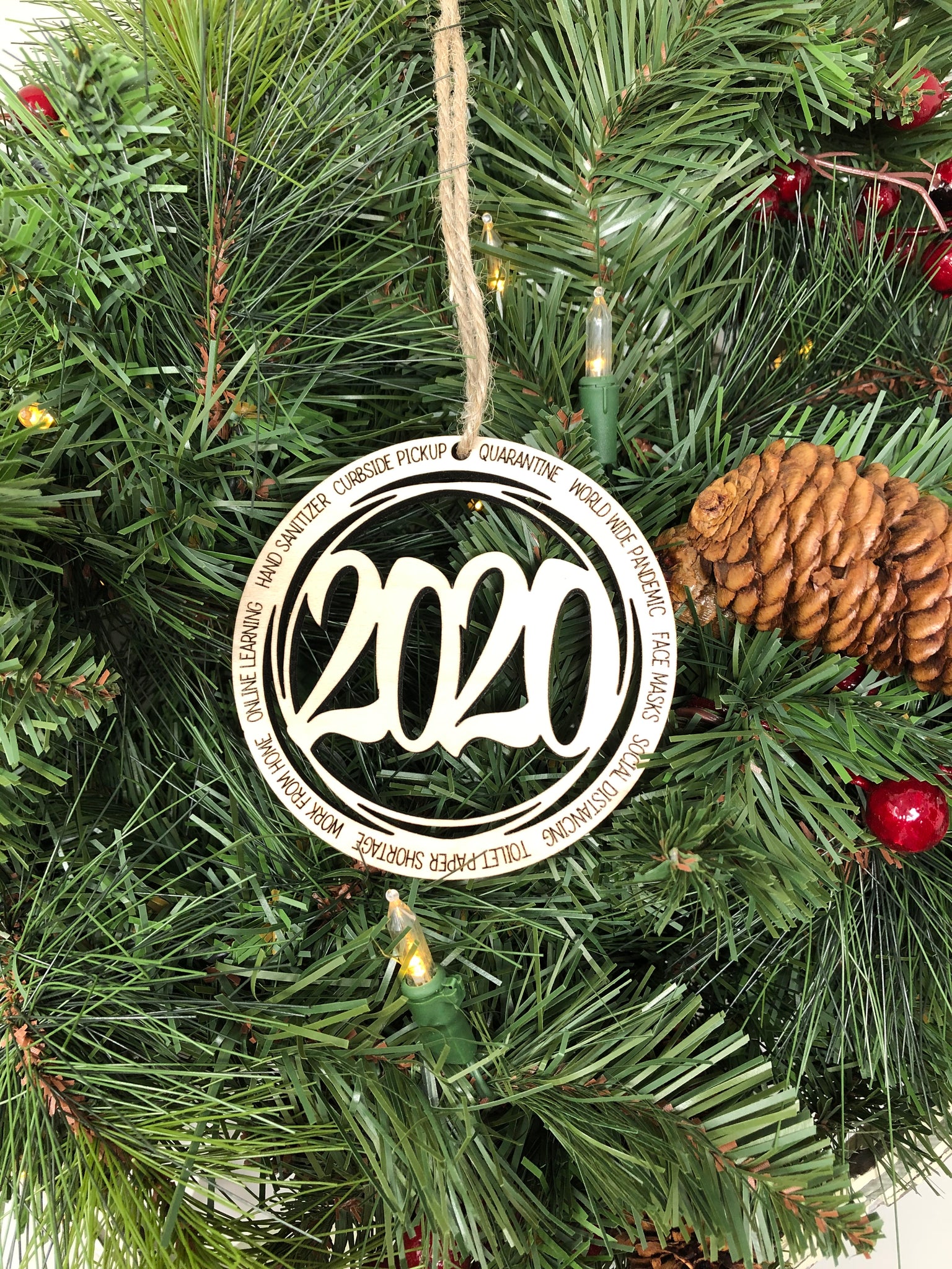 2020 Maple Wood Circle Ornament Hanging On A Christmas Tree
